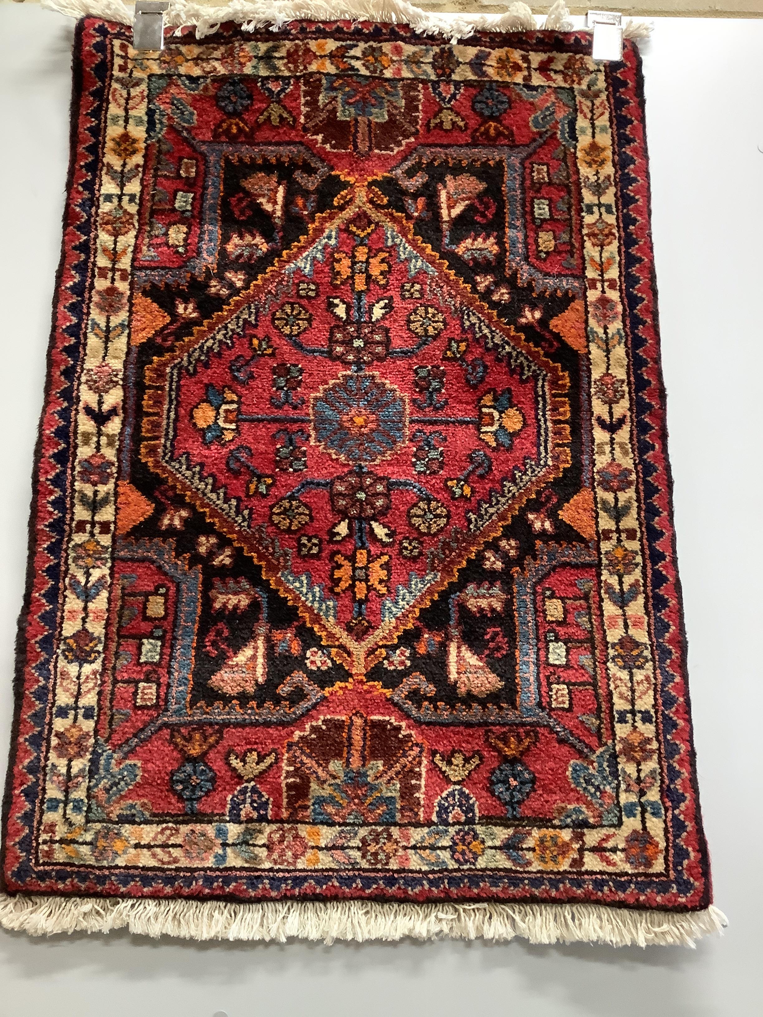 Two North West Persian rugs, larger 130 x 70cm